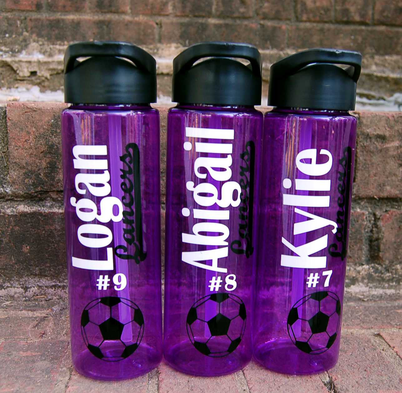 http://bevocaldesigns.com/cdn/shop/products/plastic_water_bottle_sports_with_team_name.jpg?v=1527262818